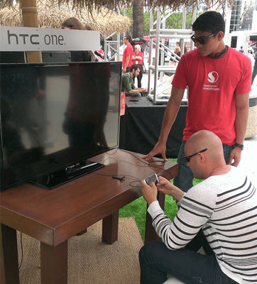 A visitor playing on an HTC one